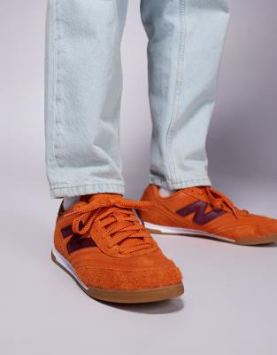 New Balance RC42 gum sole sneakers in orange and purple ASOS