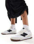 New Balance RC42 sneakers in white and black