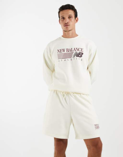 New Balance reimagined graphic 7 inch short in gebroken wit, 3 van 5
