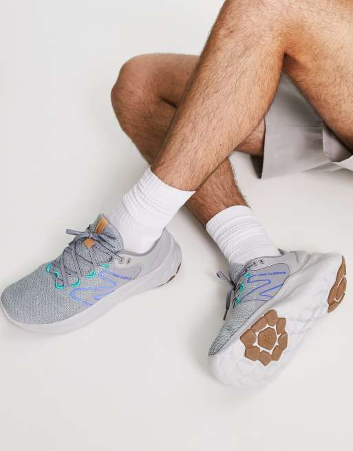 New Balance Roav running trainers in grey and blue | ASOS