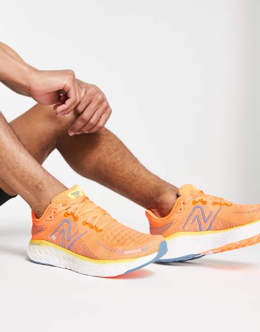 New balance store running orange