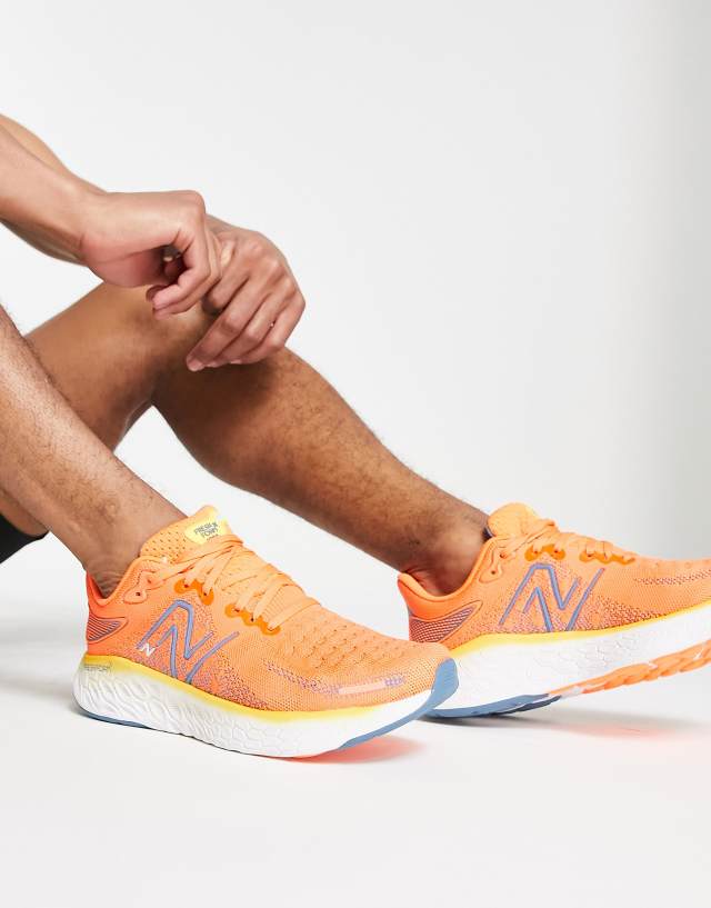 New Balance Running 1080 sneakers in orange