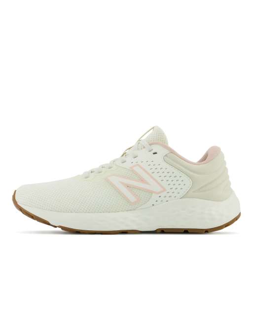 New Balance Running 520 sneakers in cream and pink ASOS