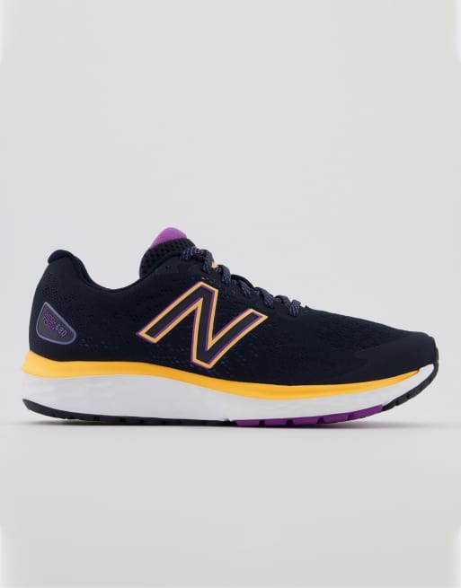 New Balance Running 680 sneakers in navy and orange 