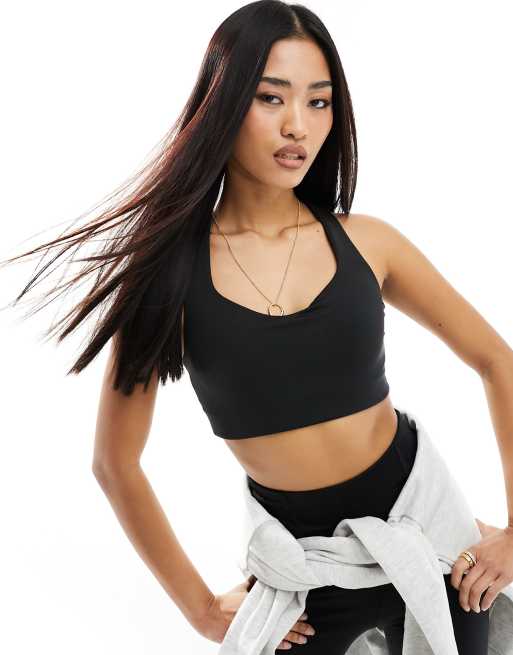 New Balance Running Accelerate bra in black | ASOS