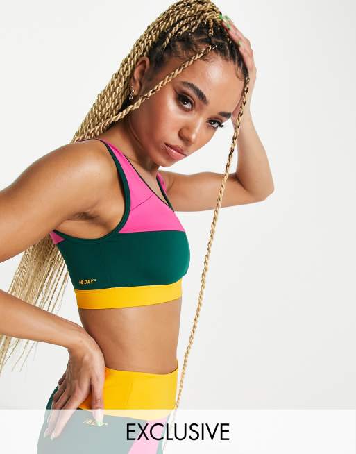 New Balance - Running Achiever Remix - Reggiseno sportivo taglio lungo a sostegno leggero color block rosa - In esclusiva per ASOS