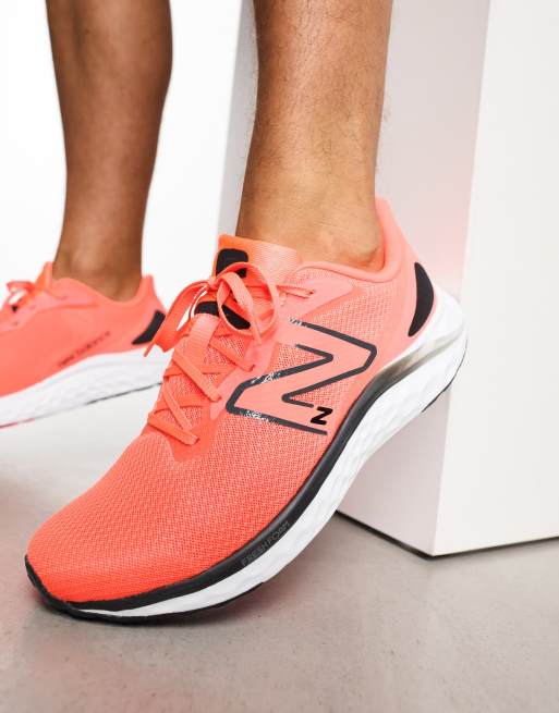 New balance store running orange