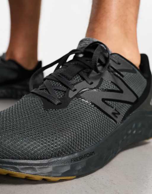 New balance running arishi clearance trainers in triple black