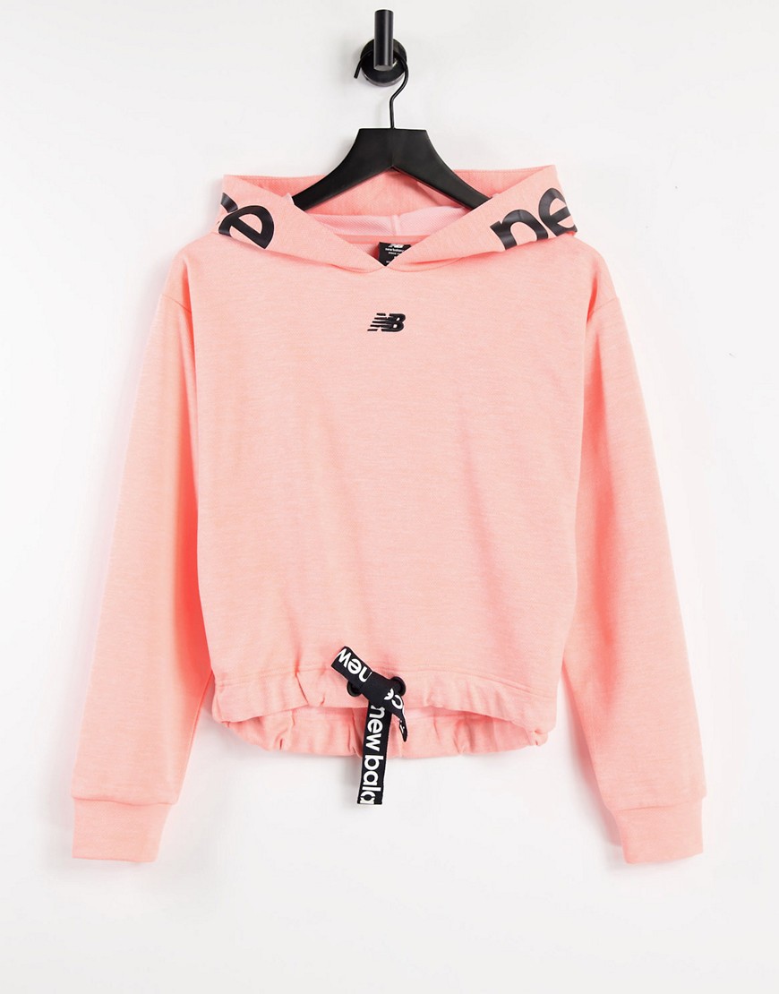 New Balance Running cropped hoodie in pink