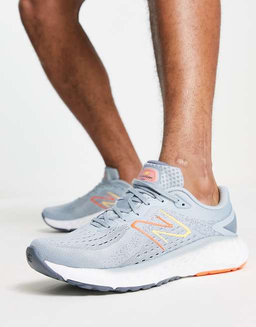 Grey orange clearance new balance shoes