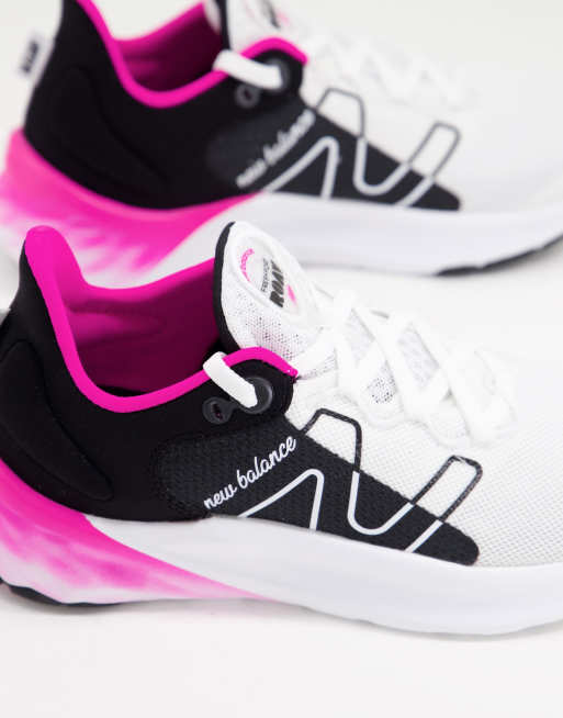 New balance black store and pink running shoes