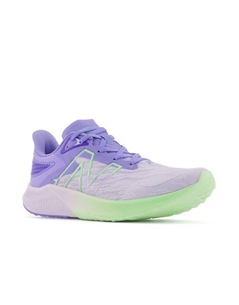 New Balance Running Fuelcell Propel trainers in purple and lime