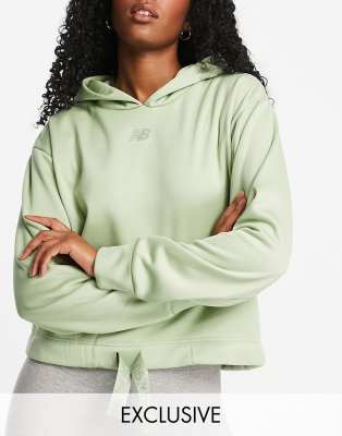 New Balance New Balance Running hoodie in sage exclusive to ASOS-Green