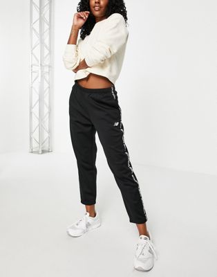 New Balance Running joggers with logo taping in black - ASOS Price Checker