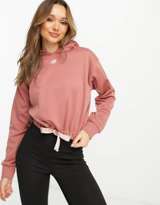 New Balance Running Relentless crop hoodie in dusky pink  - ASOS Price Checker