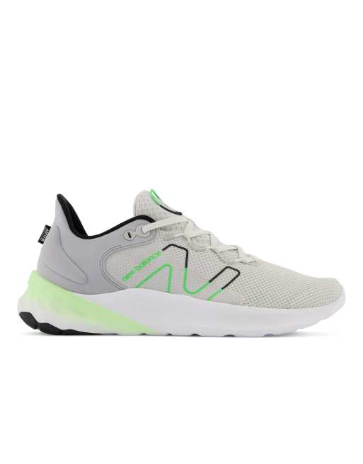 New Balance Running Roav sneakers in white and green