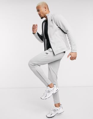 new balance running tenacity tapered joggers in black