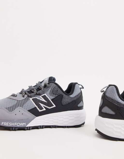 New balance crag trail trainers hot sale in grey