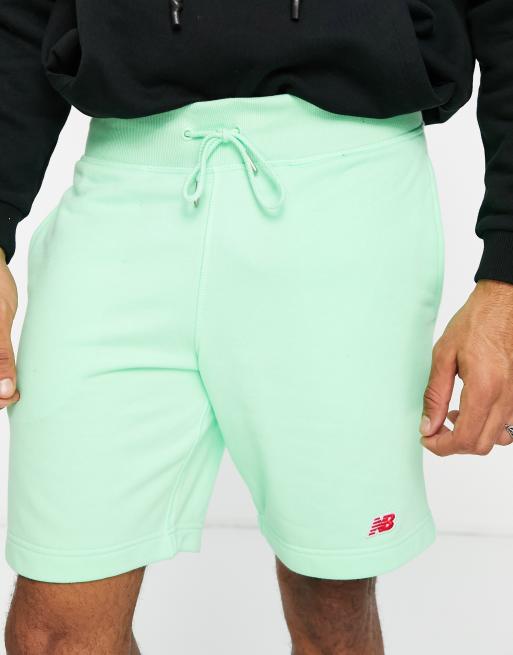 New Balance – Shorts in Minzgrün mit kleinem Logo