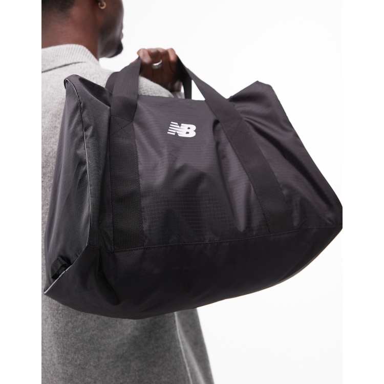 New Balance small duffle bag in black ASOS