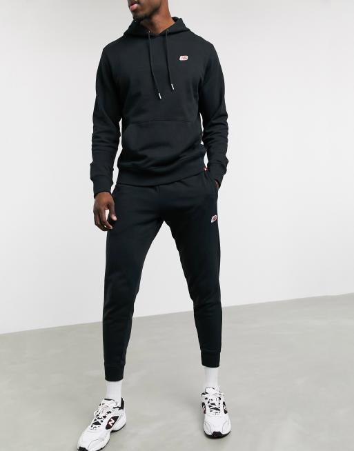 New balance sales black tracksuit