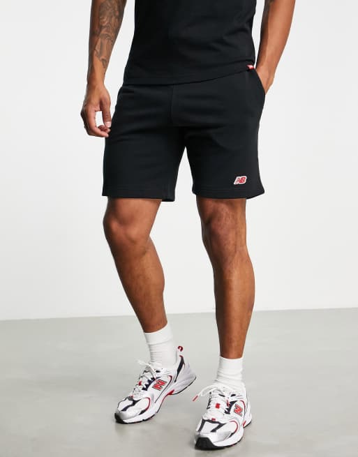 New Balance small logo shorts in black | ASOS