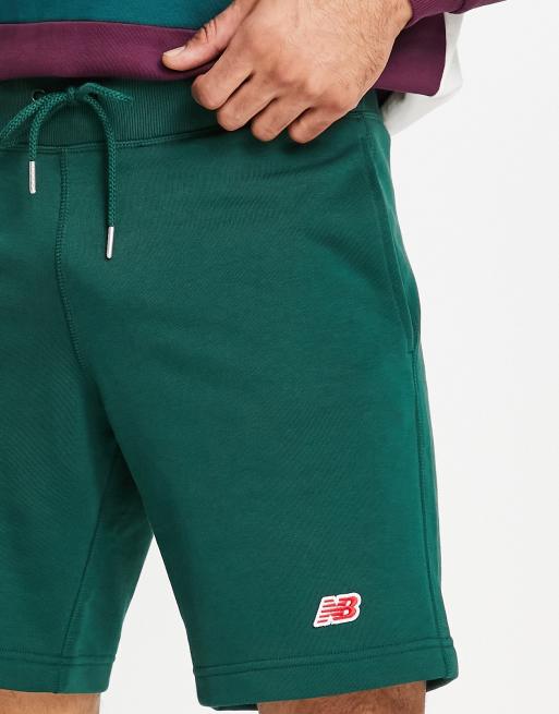 New Balance small logo shorts in dark green