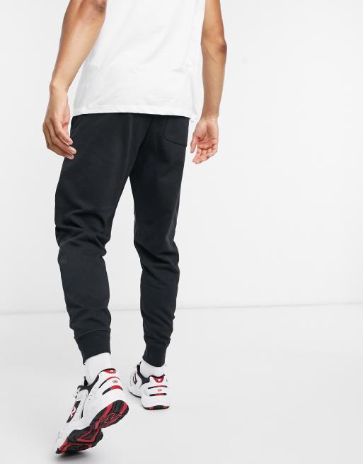 New Balance Running joggers with logo taping in black, ASOS