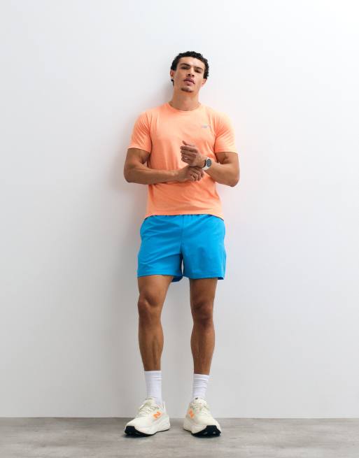 New Balance Sport Essential 5 inch short in teal blue, 3 of 5