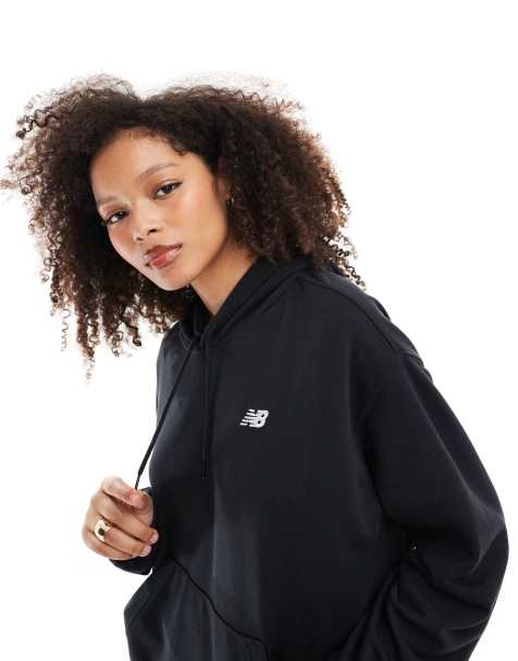 New Balance - Sport Essentials - Felpa con cappuccio nera in tessuto french terry - view 1