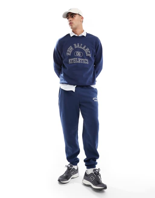 New Balance Sport essentials fleece graphic jogger set in navy ASOS