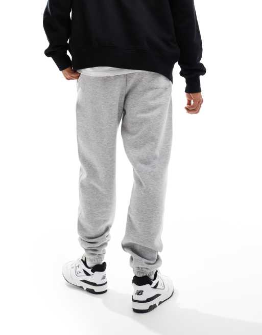 New Balance sport essentials fleece jogger in grey ASOS