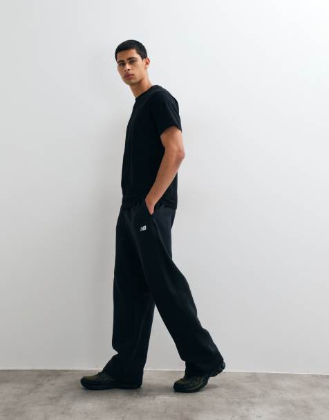 New Balance sport essentials fleece trackpant in black - view 1