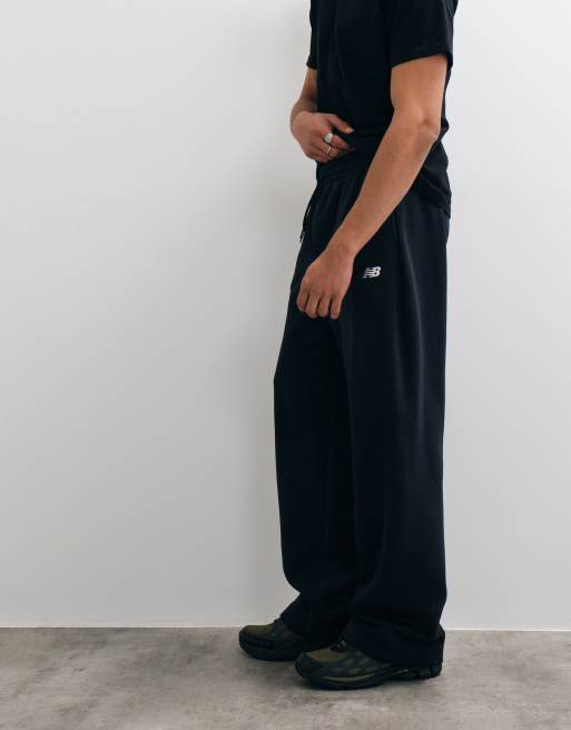 New Balance sport essentials fleece trackpant in black, 5 of 5