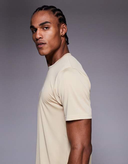 New Balance – Sport Essentials – Jasnobrązowy T-shirt w stylu utility, 4 z 5