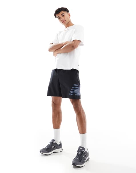 New Balance Sport essentials lined graphic short 7" in black - view 1