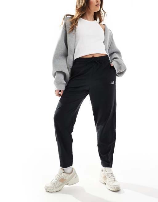 New Balance Sport essentials performance woven pant in black