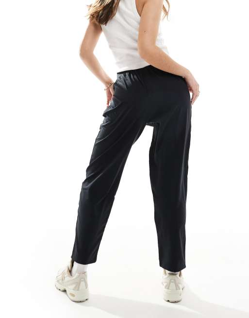New Balance Sport essentials performance woven pant in black