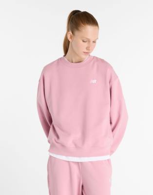 New Balance - Sport Essentials - Sweatshirt aus Frottee in Pink Taffy mit Rundhalsausschnitt-Rosa