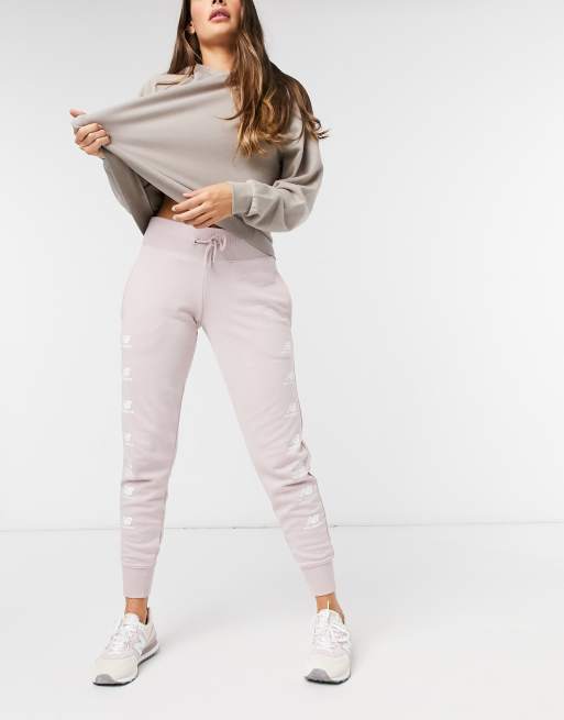 Pink best sale stacked sweatpants