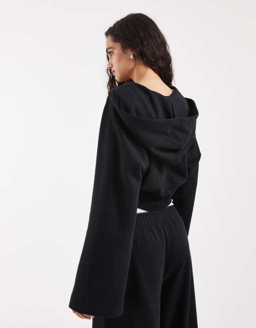 New Balance – Svart jacka i borstad fleece med dragkedja, 4 av 4
