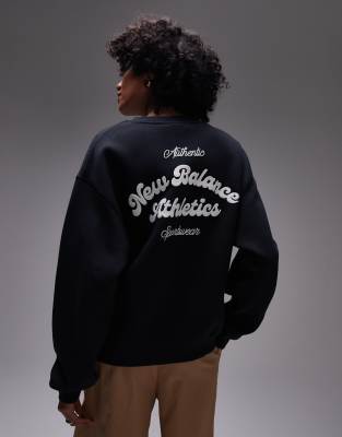 New Balance - Sweatshirt aus Fleece in Schwarz