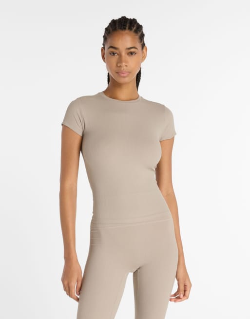 New Balance - T-shirt aderente color pietra arida a coste