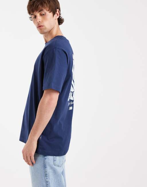 New Balance - T-shirt ondulata blu navy e bianca, 5 di 5