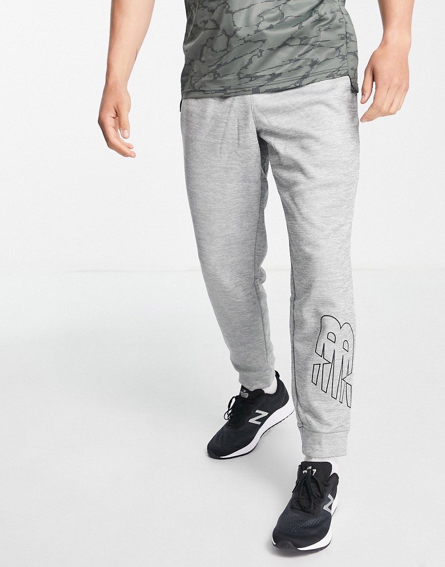 New Balance - Tenacity - Grå joggingbukser med logo