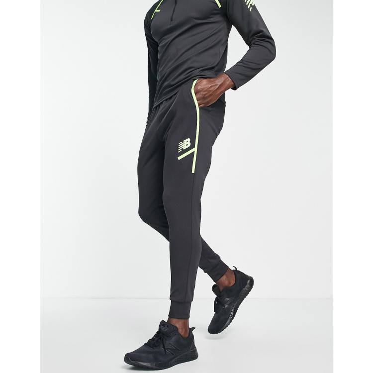 New Balance Tenacity Grit football joggers in black ASOS