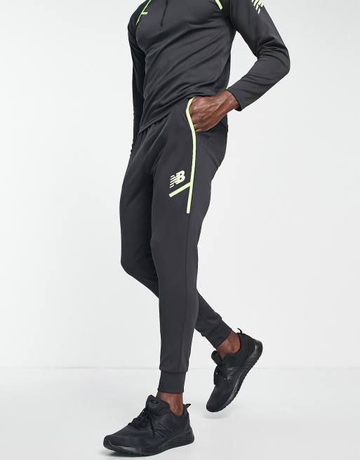 new balance tenacity football training joggers in black