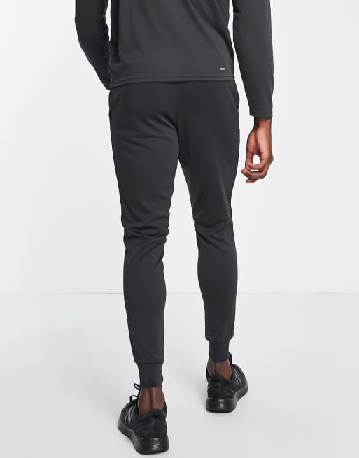 New Balance Tenacity Football Training joggers in black