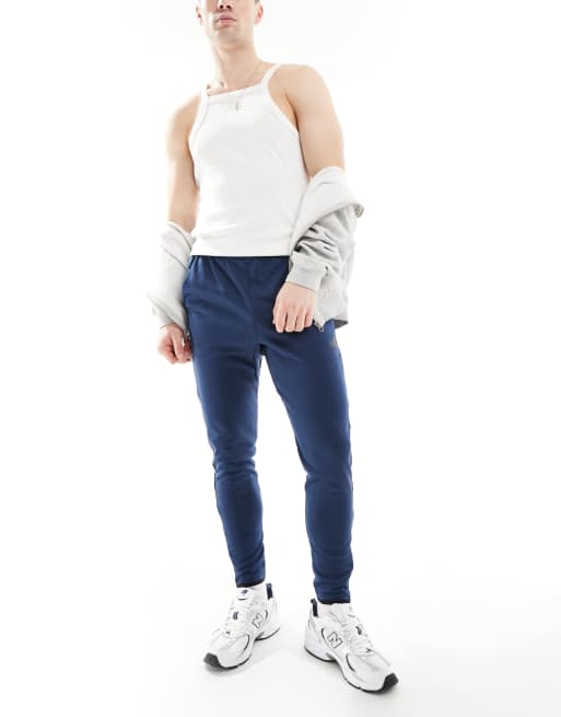 New Balance Tenacity knit training pant in blue