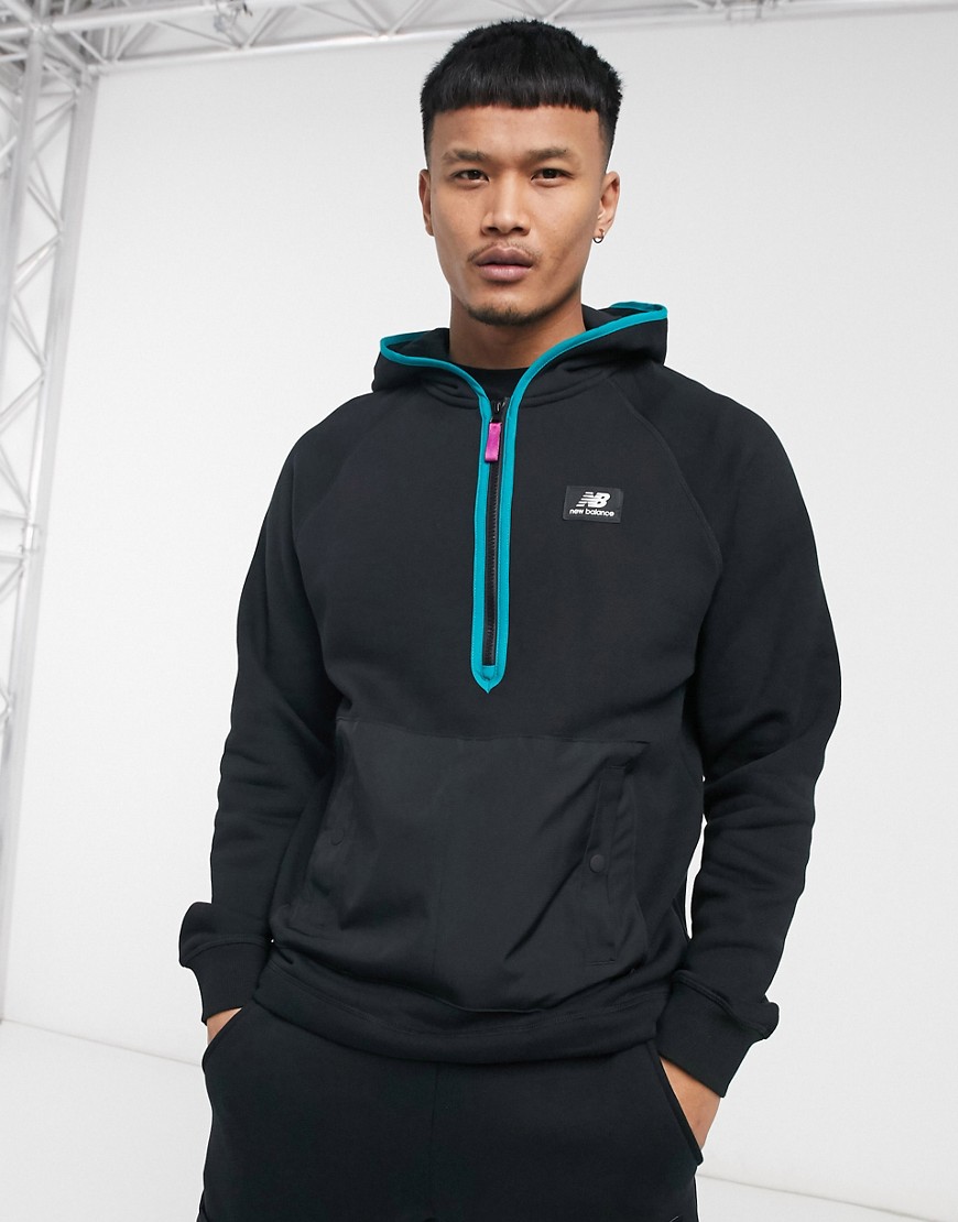 New Balance terrain hoodie in black with mesh pockets